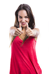 Image showing Young woman with thumbs up