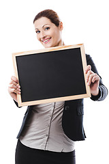 Image showing Business woman holding a chalk board