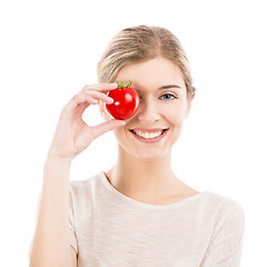 Image showing Beautiful woman holding a red chilli pepper