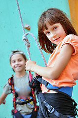 Image showing children with climbing equipment against the training wall