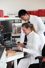 Image showing Two lab technologists at work