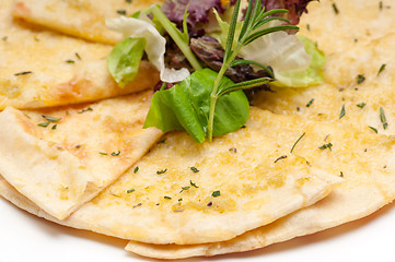 Image showing garlic pita bread pizza with salad on top
