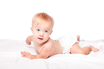 Image showing Cute baby laying on belly