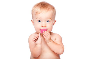 Image showing Cute baby with food spon in mouth
