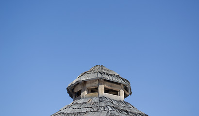 Image showing vintage house roof wood tiles background blue sky 