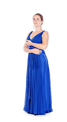 Image showing Full lenght portrait of a beautiful young woman in blue dress