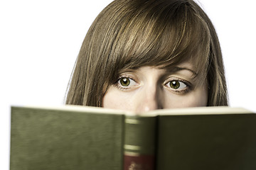 Image showing Pretty female student reads a book