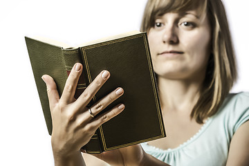 Image showing Young girl holding a book