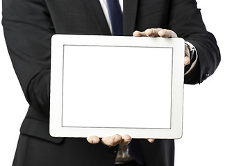 Image showing business man holds a tablet computer