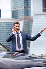 Image showing businessman shouting into the phone