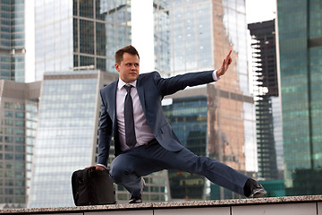 Image showing businessman defends