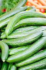 Image showing fresh green cucumber on market macro