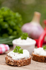 Image showing fresh tasty homemade cream cheese and herbs with bread