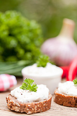 Image showing fresh tasty homemade cream cheese and herbs with bread