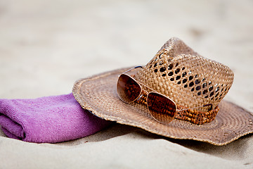 Image showing sunprotection objects on the beach in holiday