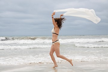 Image showing brunette attractive woman carefree on beach summer freedom