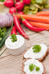 Image showing fresh tasty homemade cream cheese and herbs with bread