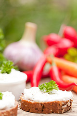 Image showing fresh tasty homemade cream cheese and herbs with bread