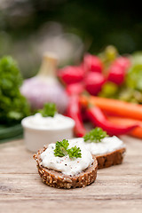 Image showing fresh tasty homemade cream cheese and herbs with bread