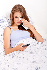 Image showing young attractive woman watching movie tv expression 