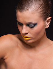 Image showing woman with extreme colorfull make up in blue and yellow