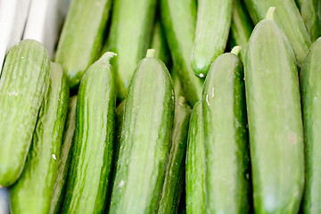 Image showing fresh green cucumber on market macro