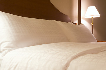 Image showing King sized bed in a hotel suite room

