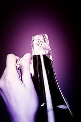 Image showing Opening champagne bottle