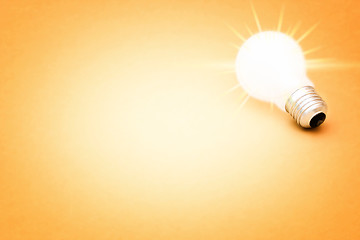 Image showing Background with lit lightbulb