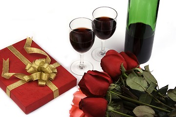 Image showing Roses With Present And Wine