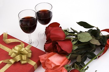 Image showing Roses With Present And Wine