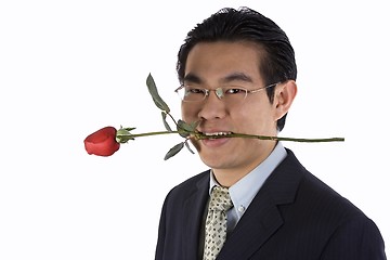 Image showing Holding Rose In Mouth