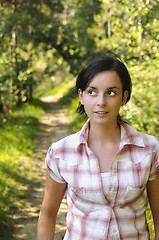 Image showing Young Caucasian girl on a hiking path