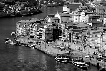 Image showing Portugal. Porto city. View of Douro river embankment  in black a