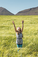 Image showing Young girl praying to god