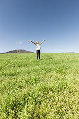 Image showing Girl smiling into the sky