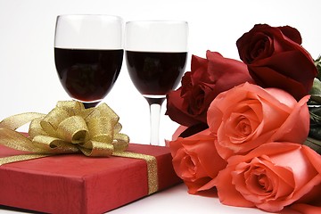 Image showing Roses With Present And Wine