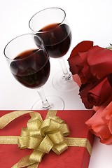 Image showing Roses With Present And Wine