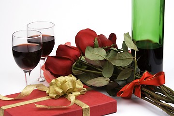 Image showing Roses With Present And Wine