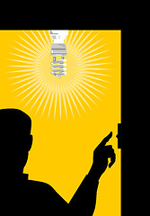 Image showing Man Switching On Lighting Bulb