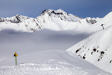 Image showing Warning sing on ski slope