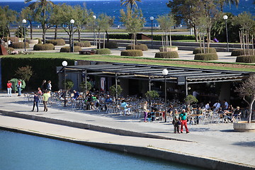 Image showing People seated at an open -air restaurant