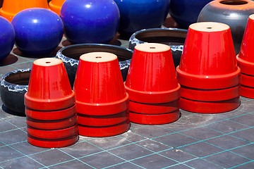 Image showing Colorful ceramic pots in market