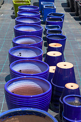 Image showing Colorful ceramic pots in market