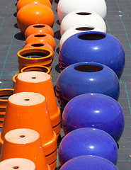 Image showing Colorful ceramic pots in market