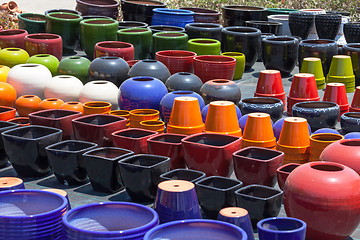 Image showing Colorful ceramic pots in market