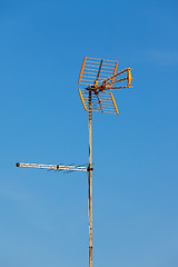 Image showing Television aerial against a blue sky