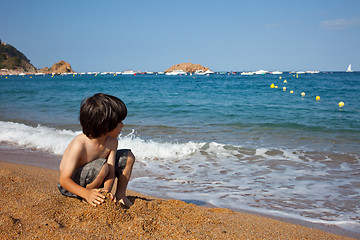 Image showing boy on the shore of  sea