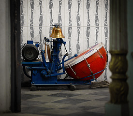 Image showing Mechanical drummer in a small temple. India, Udaipur