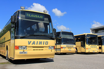 Image showing Row of Yellow Coach Buses